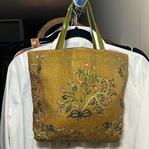 Golden floral beaded handbag.
